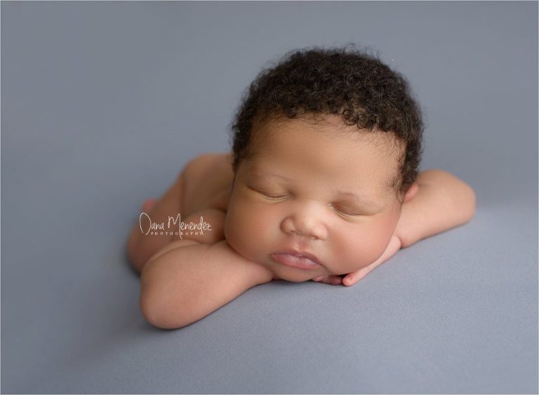 newborn baby boy chin up pose