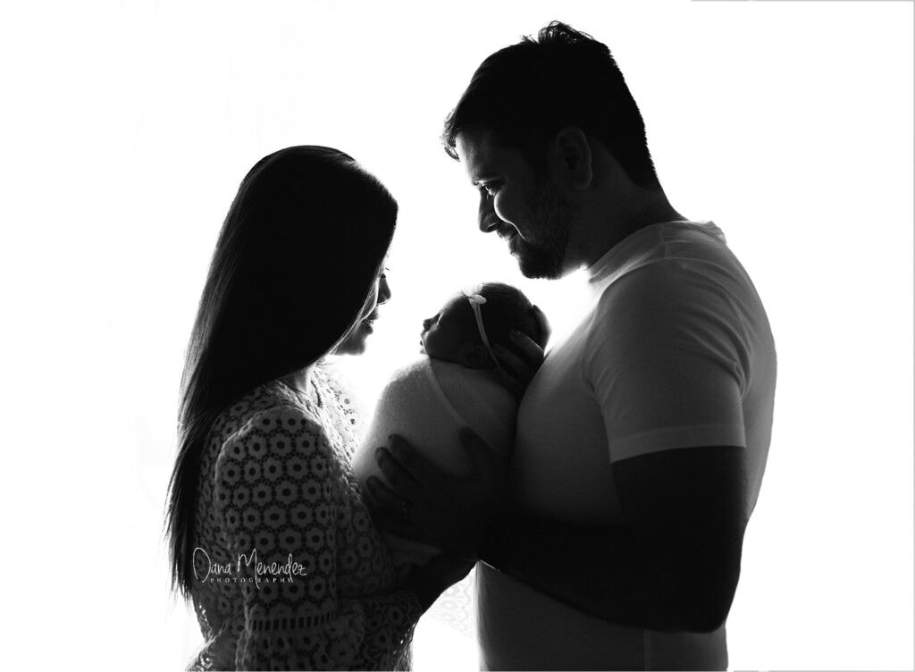 Baby Maggie newborn portrait with parents in Okotoks, AB.