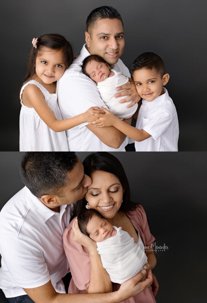 Newborn and family portrait with parents and siblings in a professional studio setting.